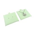 Bolsa más taco de microfibra menta para pendientes con cierre de solapa y botón para joyería y bisutería.