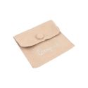 Bolsa más taco de microfibra nude para pendientes con cierre de solapa y botón para joyería y bisutería.